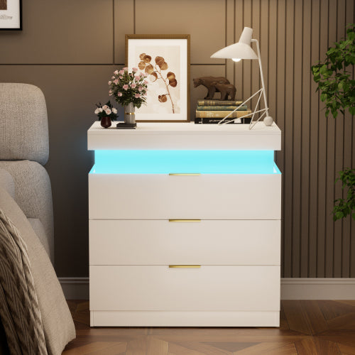 Modern white dresser with LED lighting in a room setting