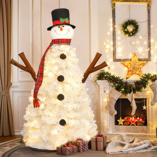 Decorative snowman tree with lights in a festive living room setting.