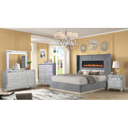 Modern bedroom set with gray bed, dresser, and nightstands in a well-lit room.
