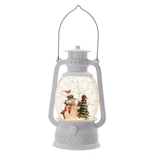 White lantern-shaped snow globe with Christmas scene inside