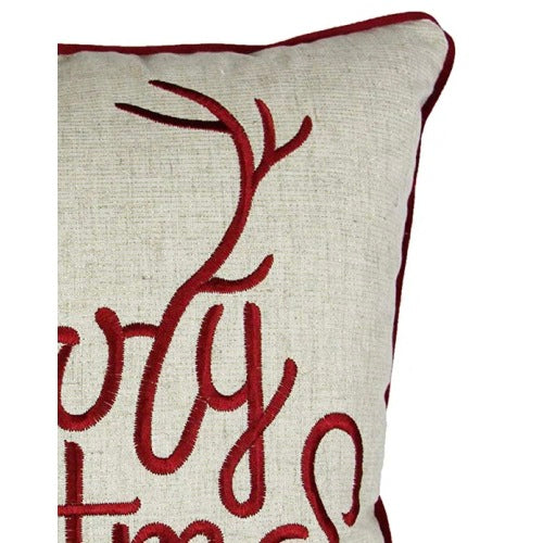 Close-up of holiday decorative pillow with gold lettering, festive home décor