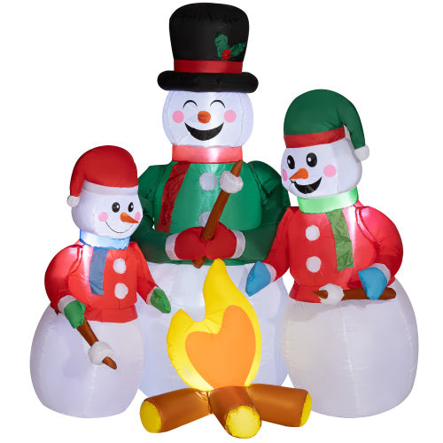 Inflatable snowman family with a campfire